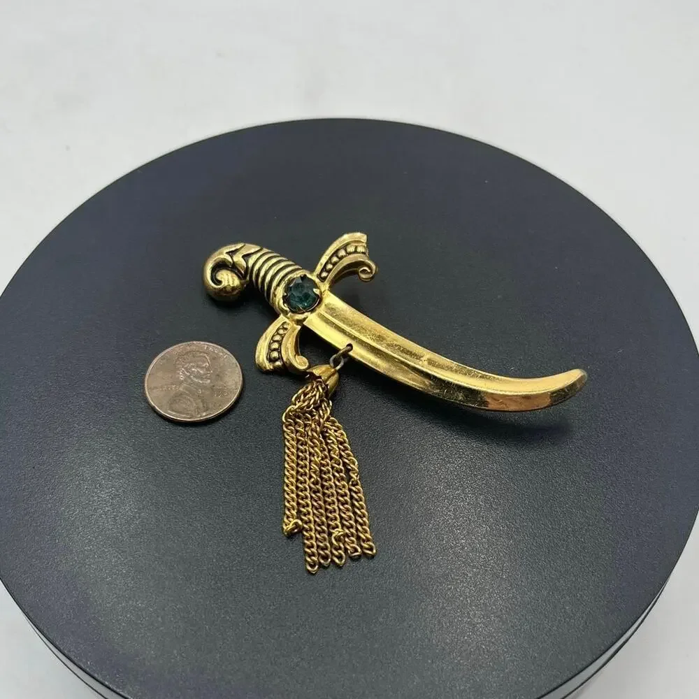 Coro Vintage Signed Gold‎ Tone Sword Dagger Brooch With Tassels and Green Stone